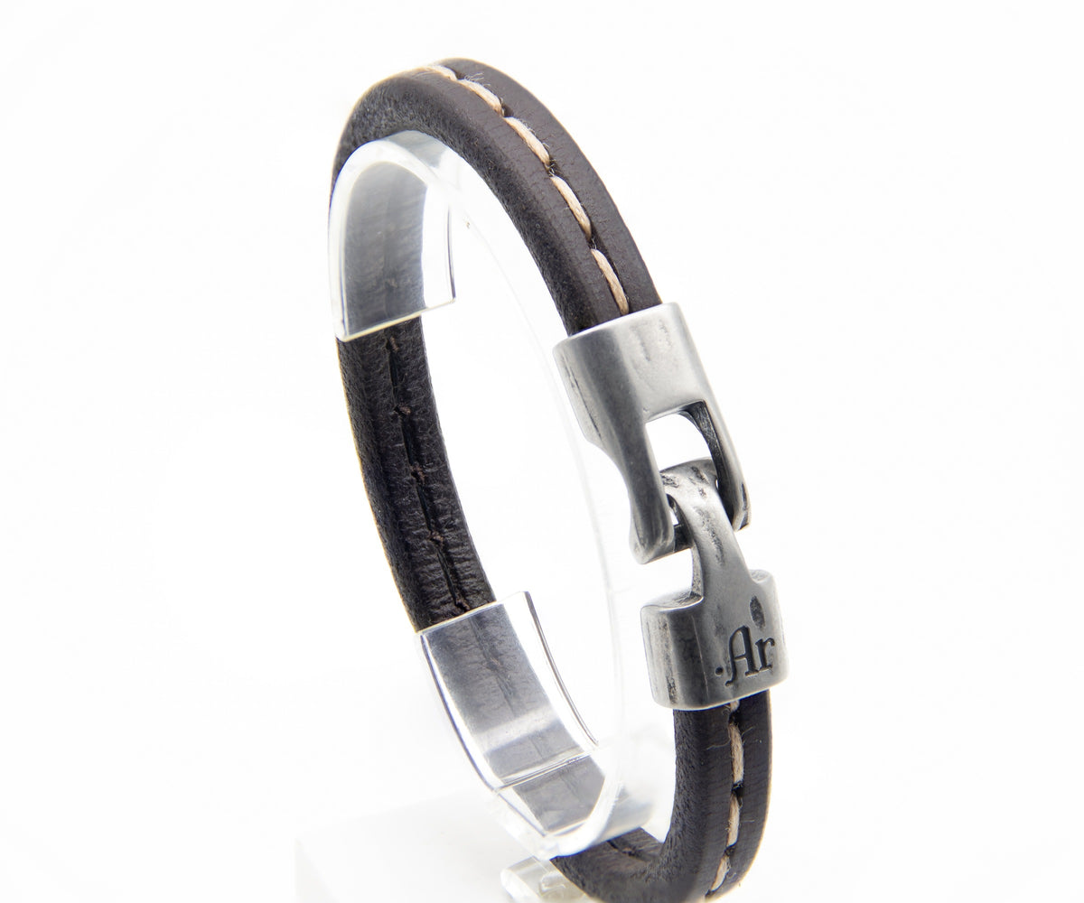 Pulsera Navegante negra con pespunte blanco en pedestal – PuntoAR