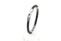 Pulsera Yeite de cuero trenzado negro con cierre metálico grabado – PuntoAR