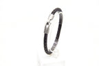 Pulsera Yeite de cuero trenzado negro con cierre metálico grabado – PuntoAR